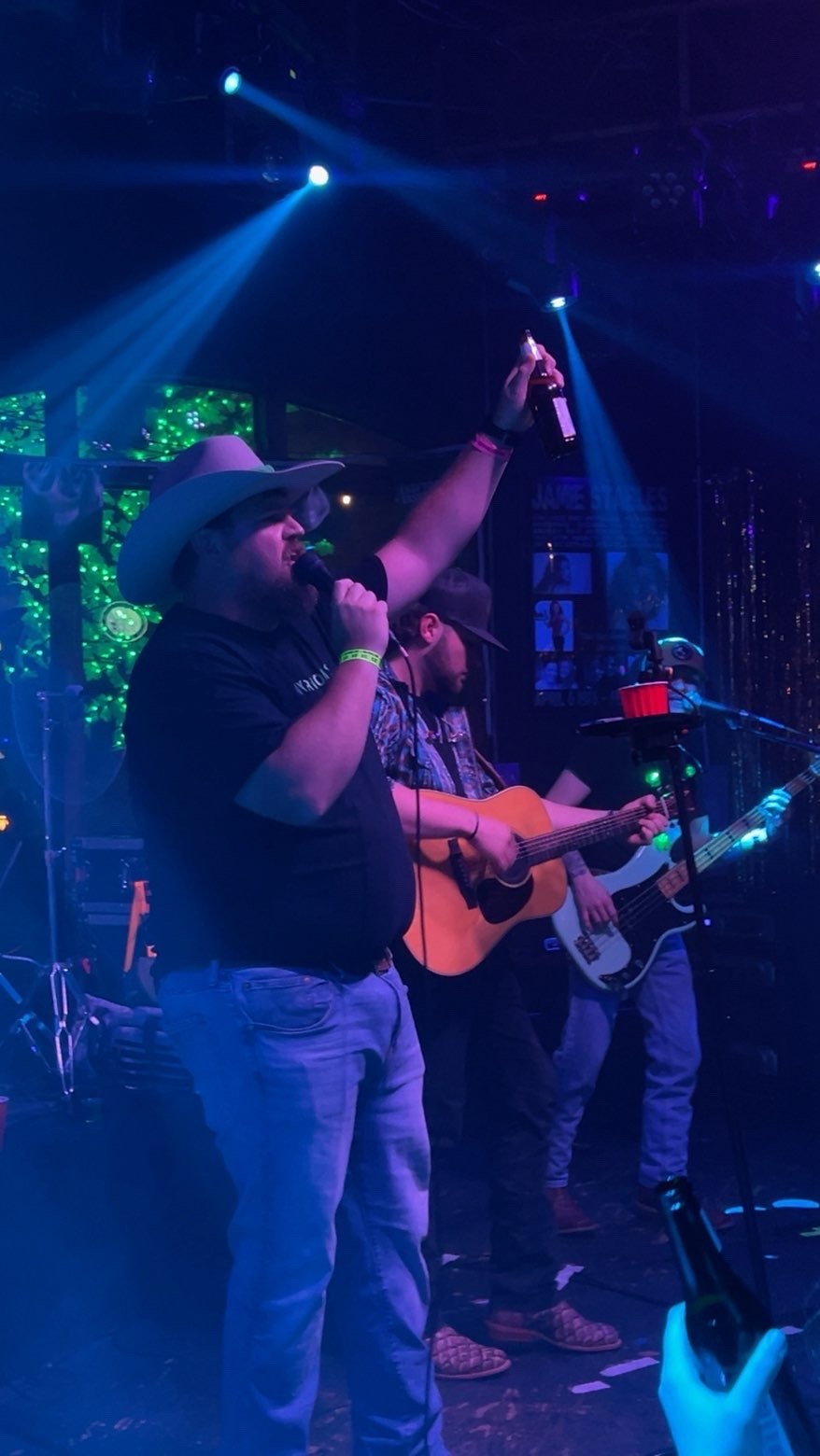 Scotty Sams singing on stage